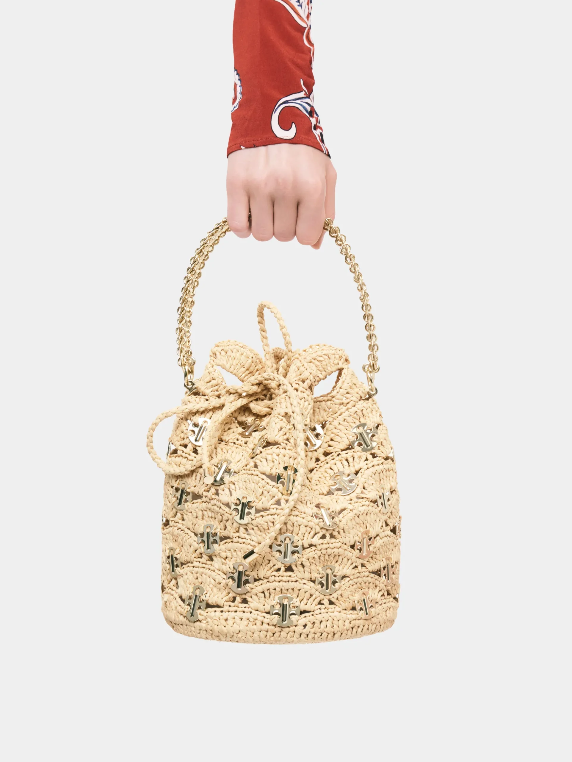 New Raphia wave bucket bag with signature 1969 discs | Rabanne Sale